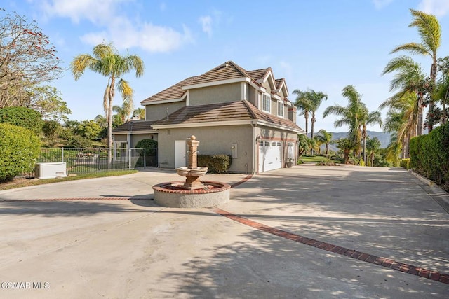 front of property with a garage