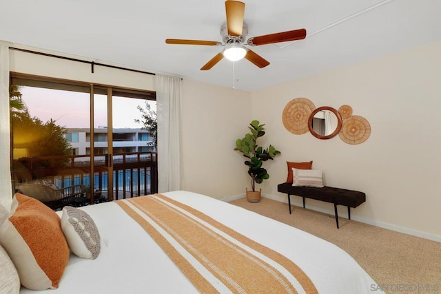 carpeted bedroom with access to outside and ceiling fan