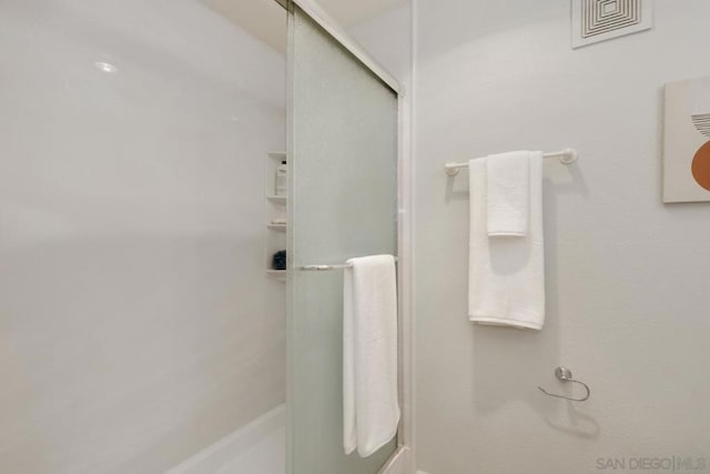 bathroom featuring walk in shower