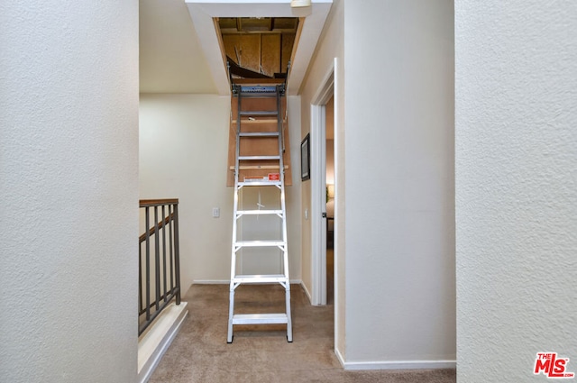 interior space featuring light colored carpet