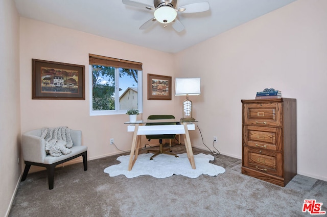 carpeted office with ceiling fan