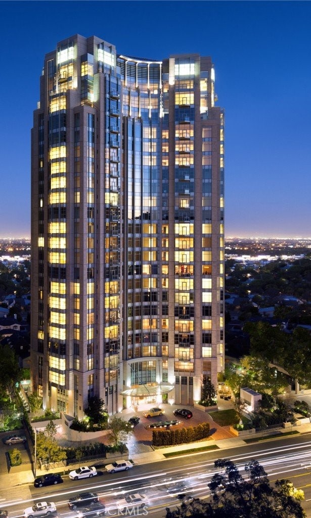 view of outdoor building at dusk