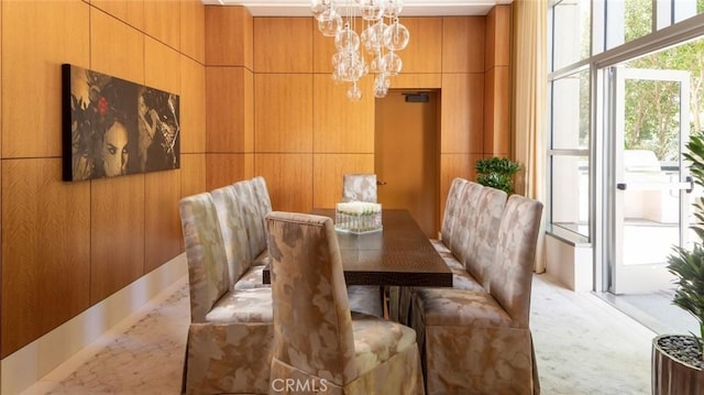 dining room featuring a chandelier