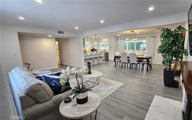 living room featuring light wood-type flooring