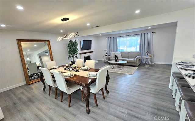 dining space with light wood-type flooring