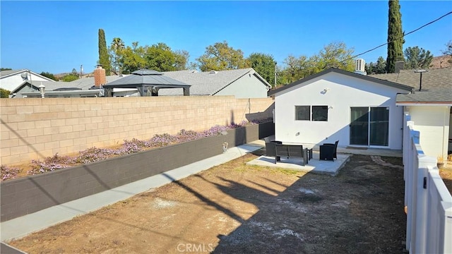 view of yard with a gazebo and a patio area