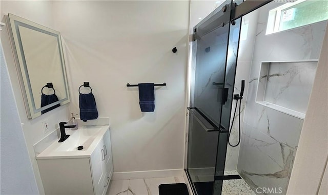 bathroom with vanity and walk in shower