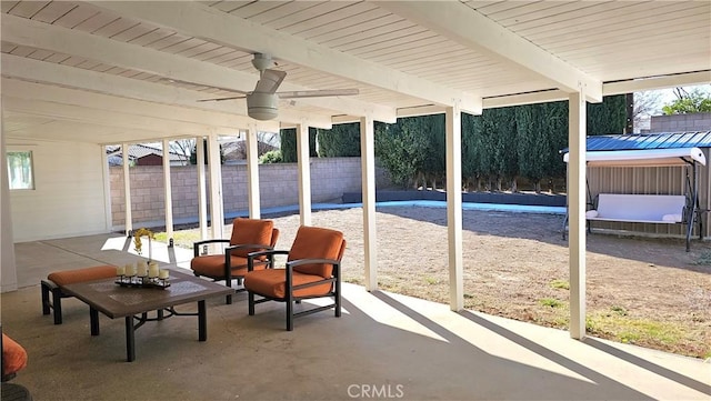 exterior space featuring ceiling fan