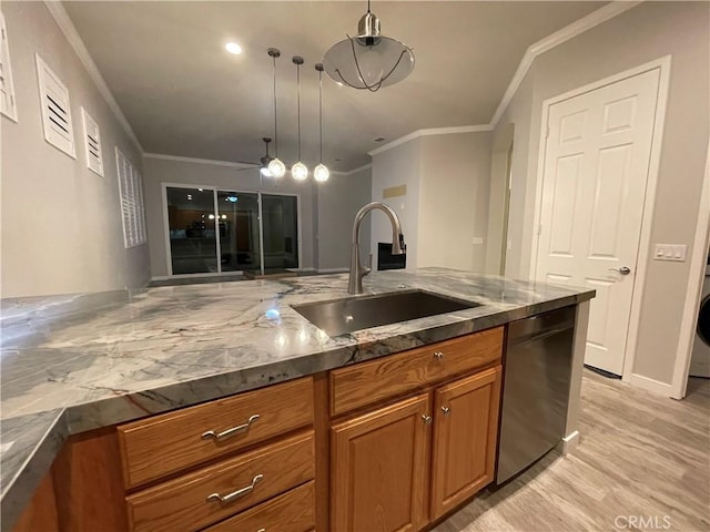 kitchen featuring a sink, ornamental molding, stainless steel dishwasher, brown cabinets, and pendant lighting