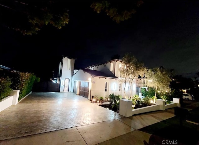 view of front of home with a garage