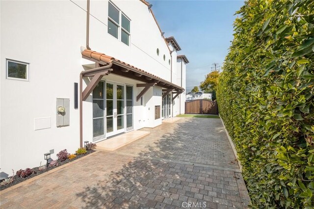 back of house featuring a patio