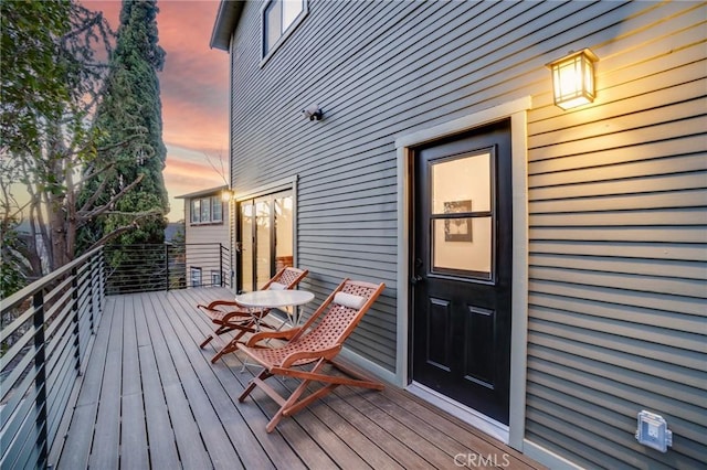 view of deck at dusk