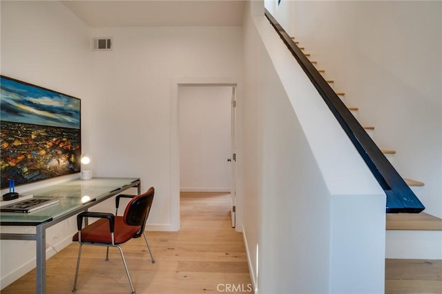 office space featuring light wood-type flooring