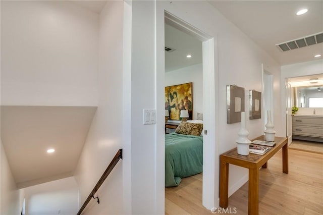 hallway featuring light hardwood / wood-style floors