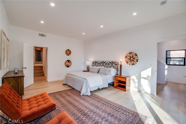 bedroom with light hardwood / wood-style flooring