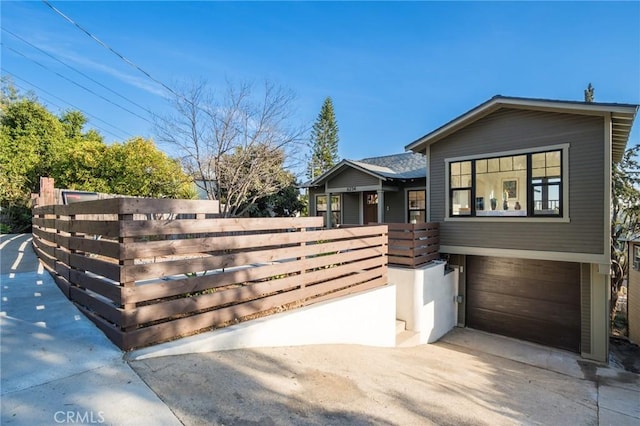 view of front of home with a garage