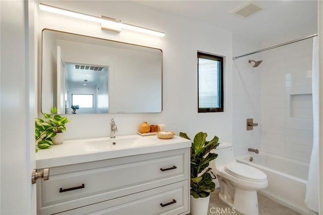 full bathroom with vanity, toilet, and shower / bath combo