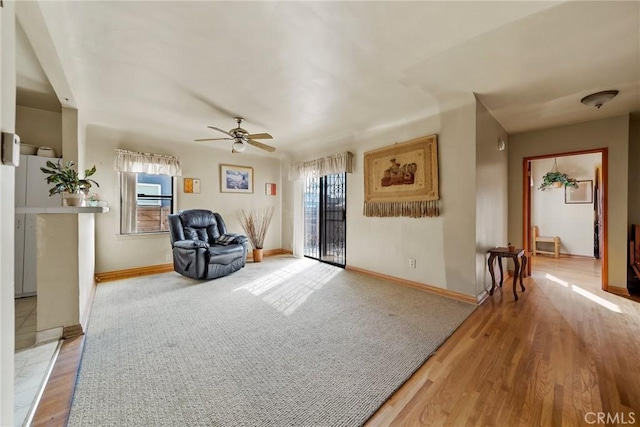 unfurnished room featuring hardwood / wood-style floors and ceiling fan