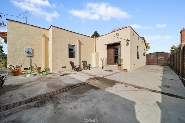 back of house featuring a patio area