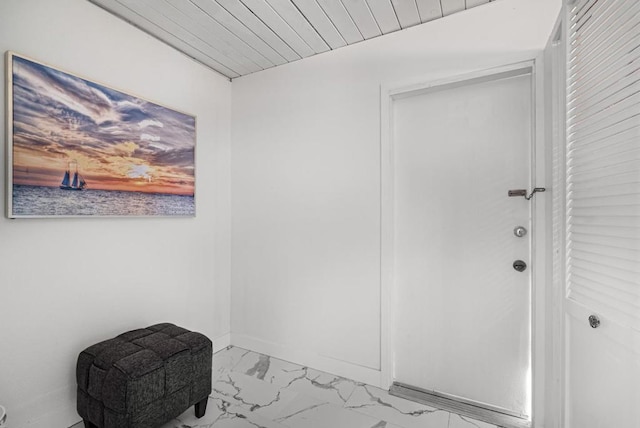 interior space featuring wood ceiling