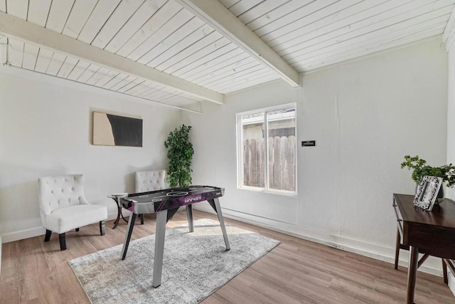 office with beamed ceiling, wood ceiling, and light hardwood / wood-style floors