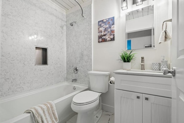 full bathroom featuring tiled shower / bath, vanity, and toilet