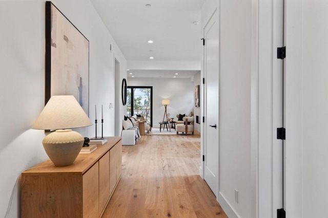 hallway featuring light hardwood / wood-style flooring