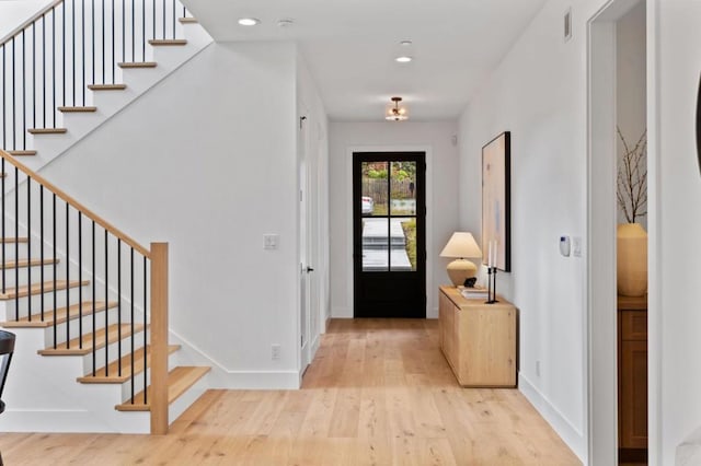 entrance foyer featuring light hardwood / wood-style floors