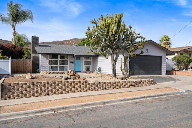 ranch-style home with a garage