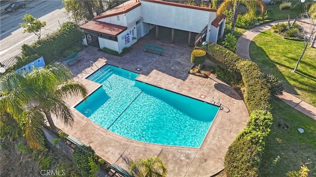 pool with a patio area