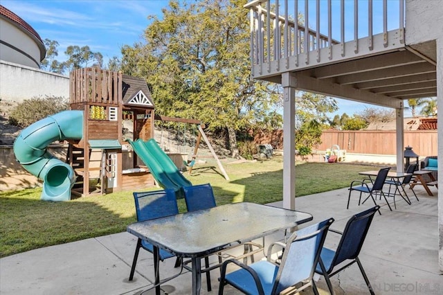 view of patio featuring a playground