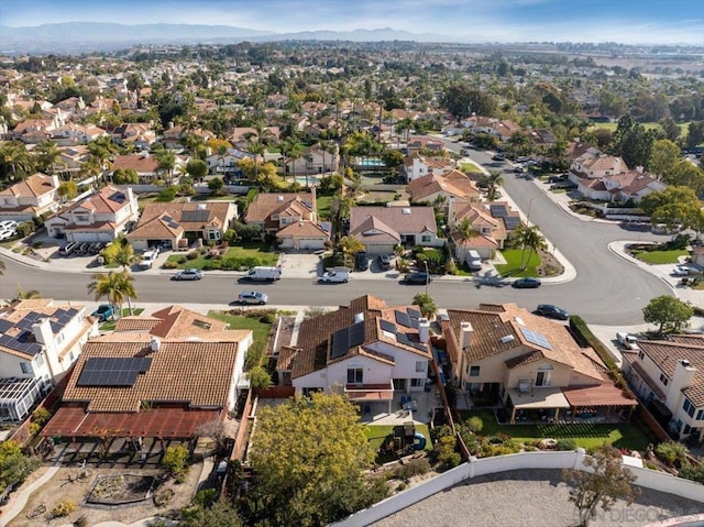 drone / aerial view featuring a mountain view