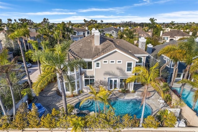 drone / aerial view with a residential view