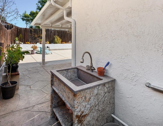 view of patio featuring sink