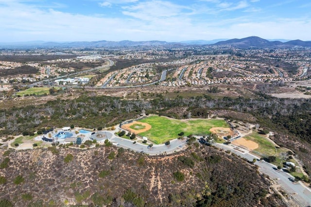 drone / aerial view featuring a mountain view