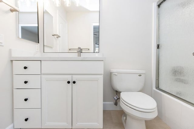 full bathroom featuring vanity, toilet, and combined bath / shower with glass door