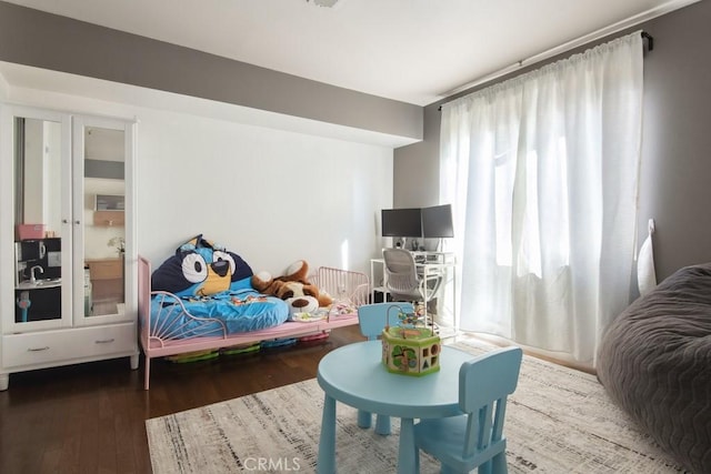 bedroom featuring wood-type flooring