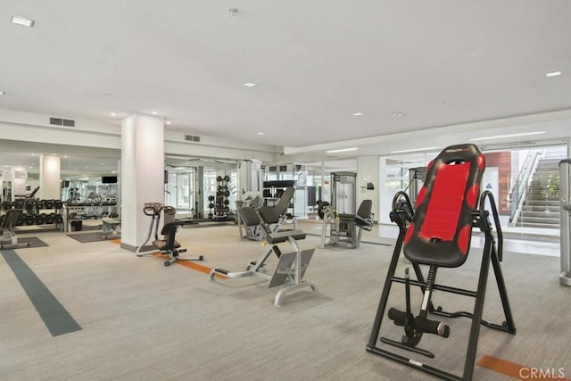 workout area with light colored carpet