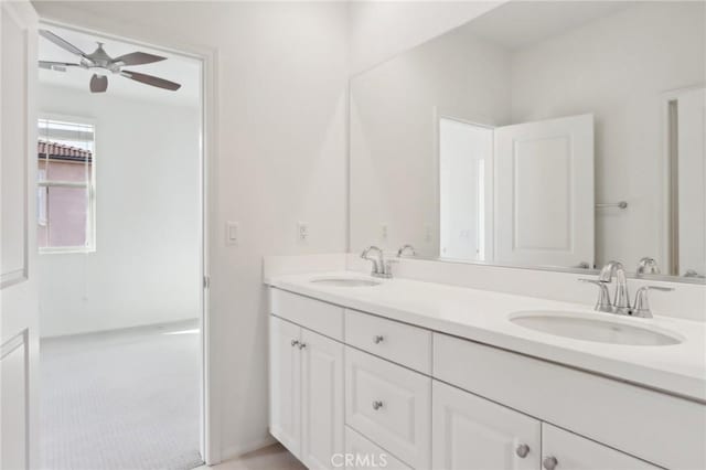 bathroom featuring vanity and ceiling fan