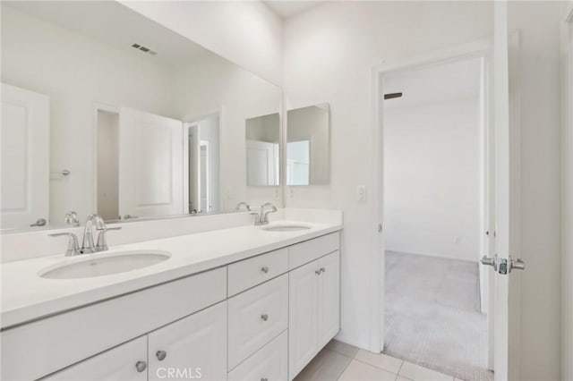 bathroom featuring vanity and tile patterned floors