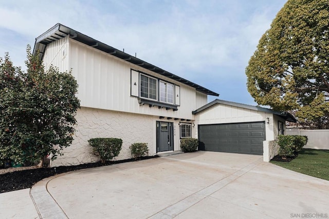 view of front of home with a garage