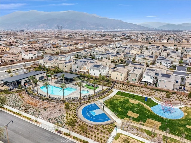 bird's eye view with a residential view and a mountain view