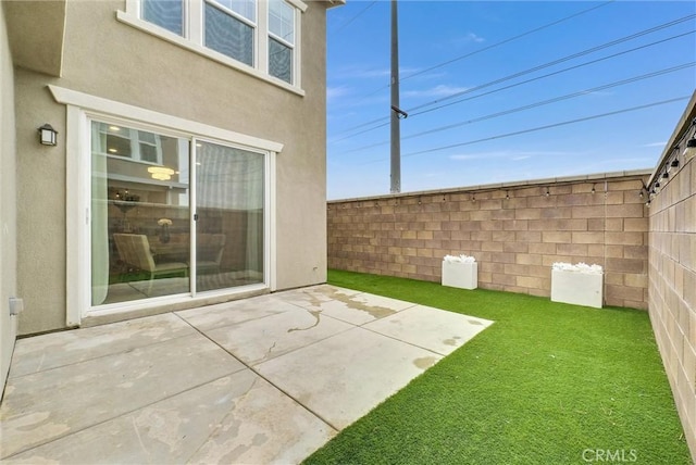 view of patio with a fenced backyard