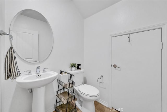 bathroom featuring toilet