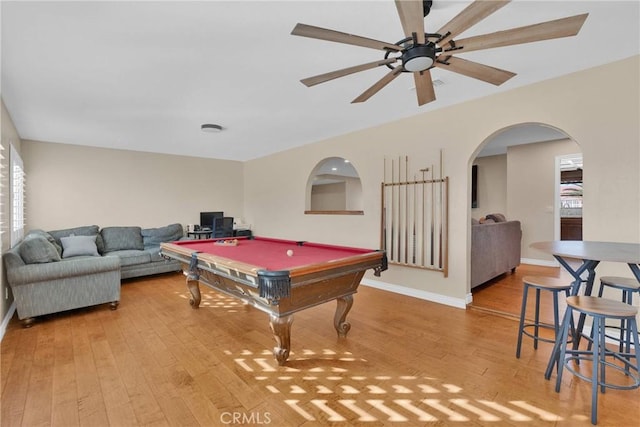 recreation room featuring hardwood / wood-style floors, pool table, and ceiling fan