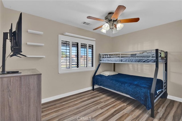 bedroom featuring hardwood / wood-style flooring and ceiling fan