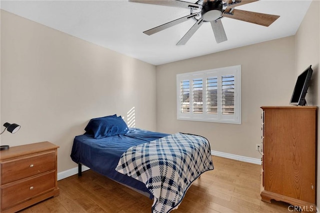 bedroom featuring ceiling fan and light wood-type flooring