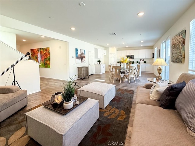 living room with hardwood / wood-style flooring