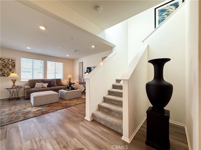 stairs with wood-type flooring