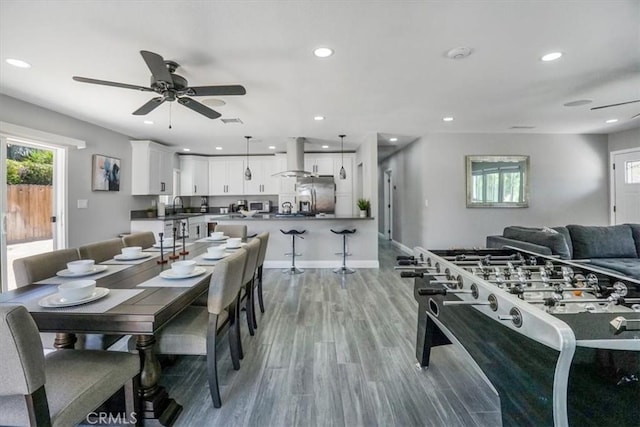 39120 Paradise Way, Cathedral City, CA 92234 - dining space with sink, light hardwood / wood-style flooring, and ceiling fan